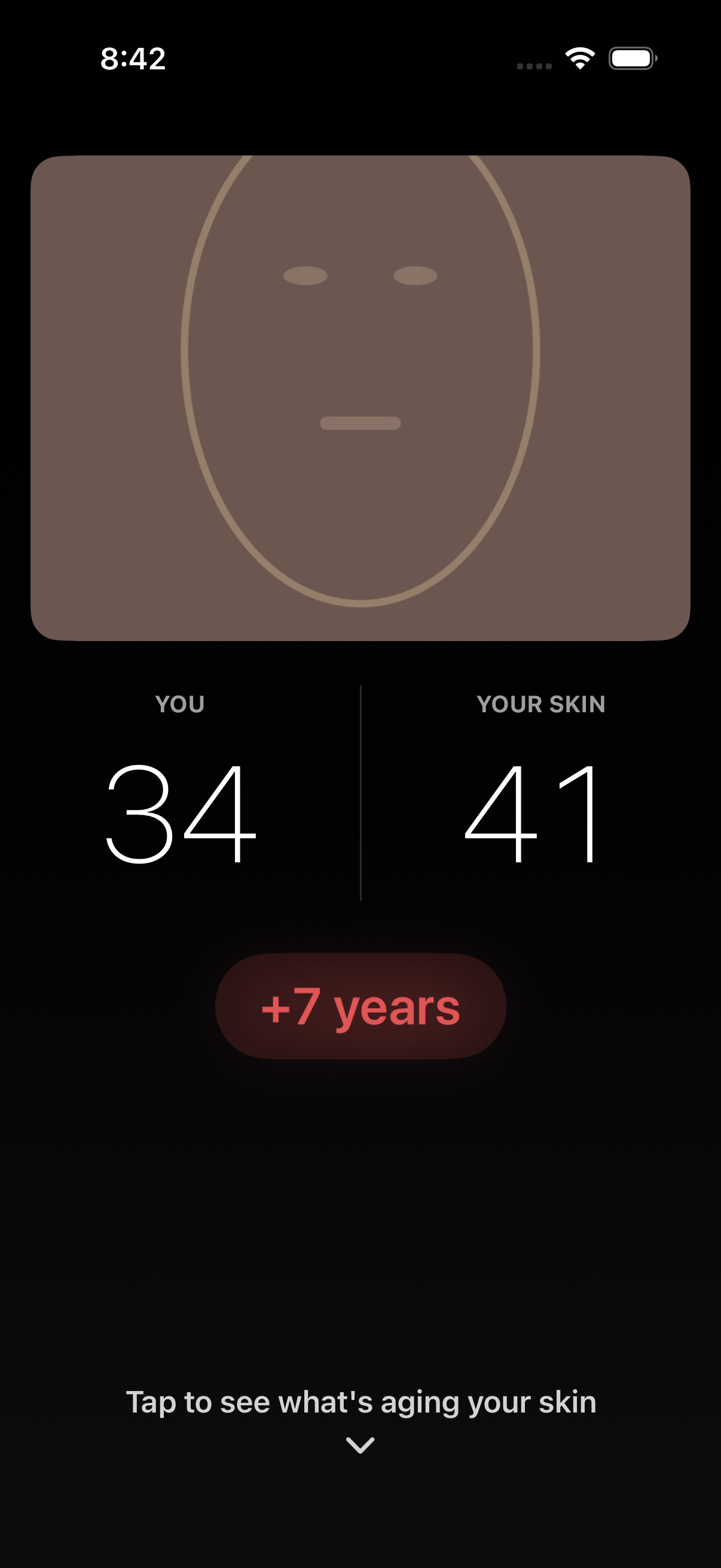 Skin Age reveal screen showing user age and skin age